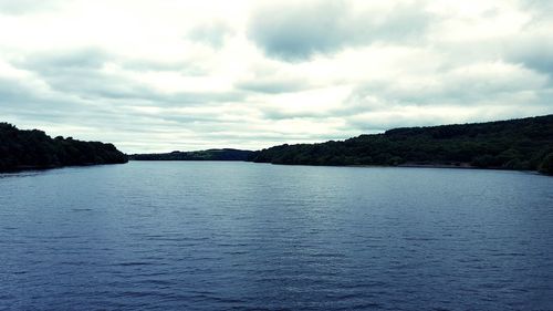 Scenic view of river against sky