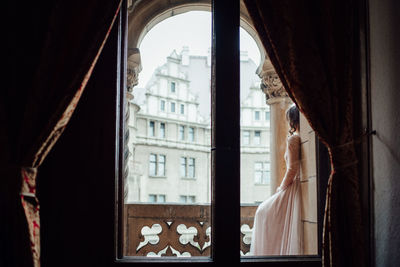 Buildings seen through window