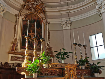 Low angle view of chandelier in building