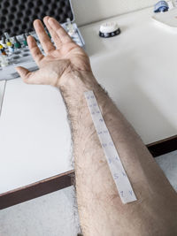 High angle view of man working on table