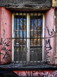 Graffiti on wall of old building