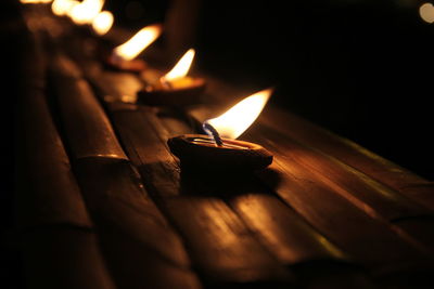 Close-up of burning candles