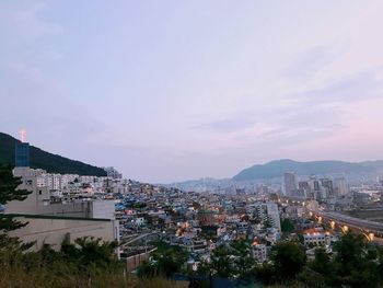 High angle view of buildings in city against sky