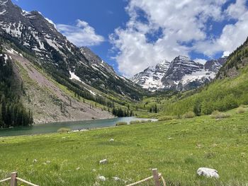 Scenic view of snowcapped mountains against sky