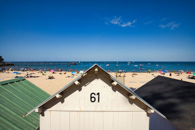 Scenic view of sea against blue sky