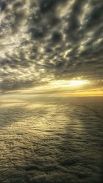 Scenic view of sea against dramatic sky