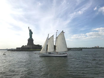 Statue of ship in sea