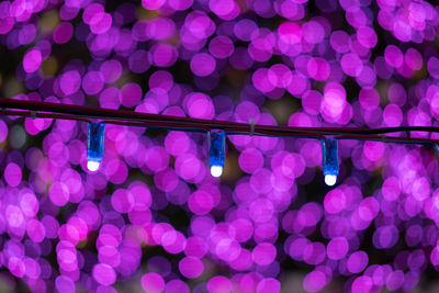 Defocused image of illuminated lights at night