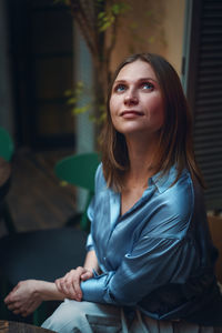 Woman portrait, in a cafe close up