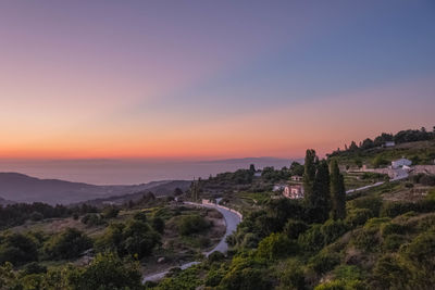 Scenic view of landscape against sky during sunset
