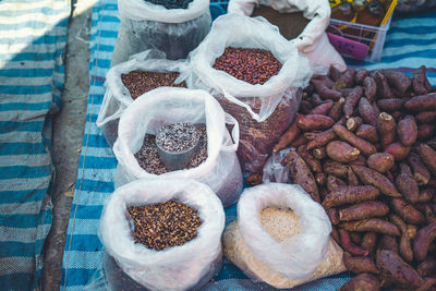 High angle view of food grains for sale at market stall