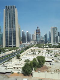 Modern buildings in city against sky