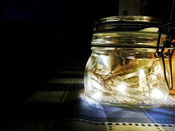 Close-up of glass jar on table at home