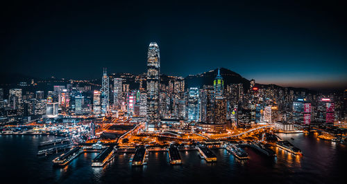 Illuminated buildings in city at night