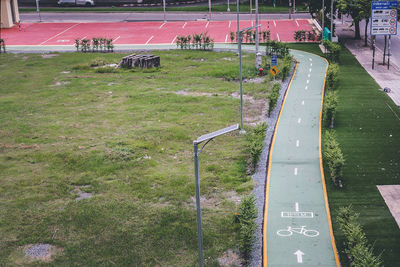 High angle view of text on grass