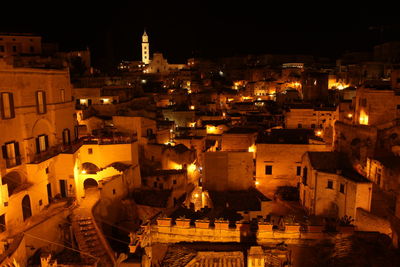 High angle view of illuminated buildings in city