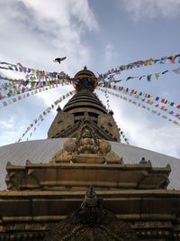 Low angle view of traditional building against sky