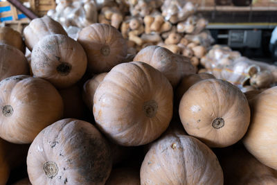 High angle view of pumpkins for sale at market stall