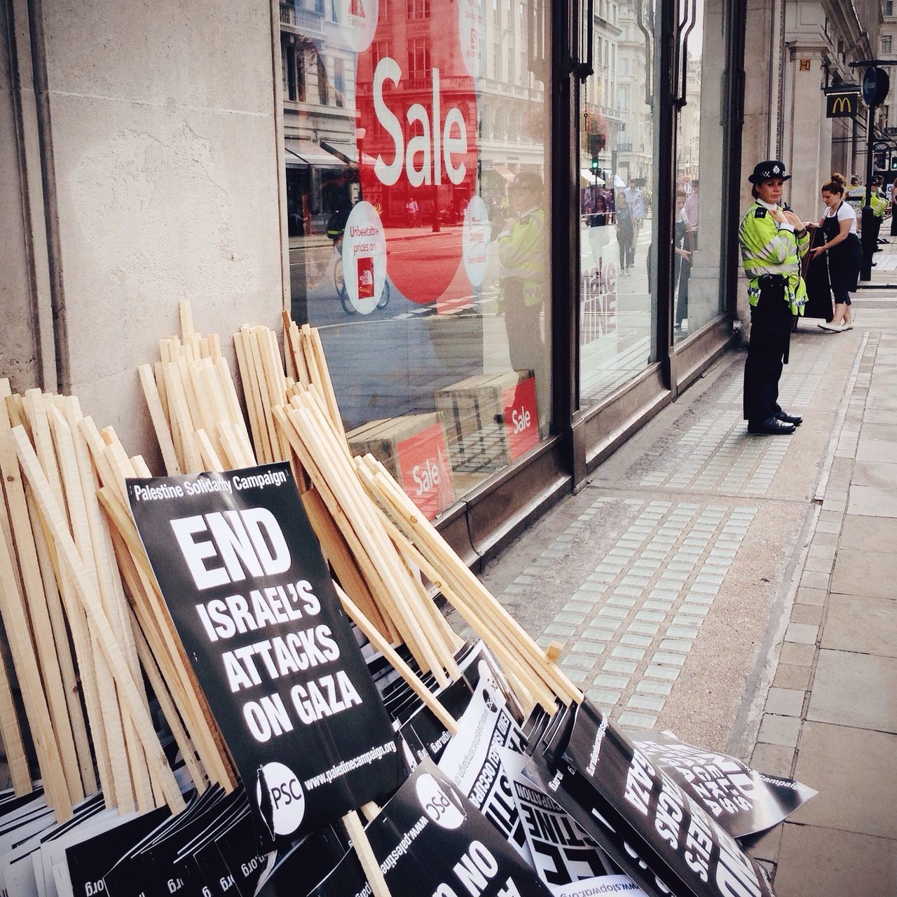 text, western script, communication, non-western script, retail, men, store, incidental people, person, information sign, lifestyles, day, street, sign, information, market, variation, wood - material