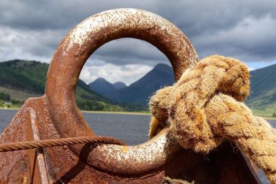 Close-up of rope tied on abandoned rusty boat