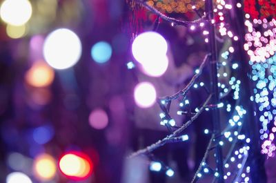 Close-up of illuminated christmas lights at night