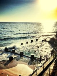 Scenic view of sea at sunset