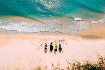 High angle view of boats moored at beach