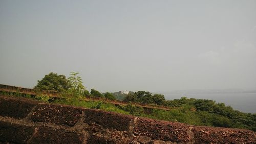 Scenic view of land against clear sky