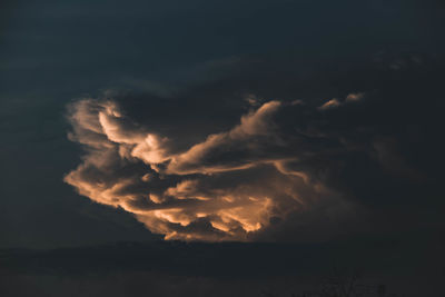 Low angle view of dramatic sky during sunset