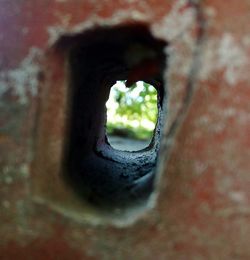 Close-up of hole on wall