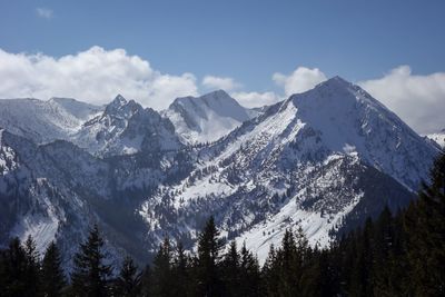 Scenic view of snowcapped mountains against sky