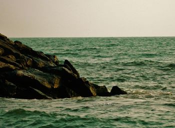 Scenic view of sea against clear sky