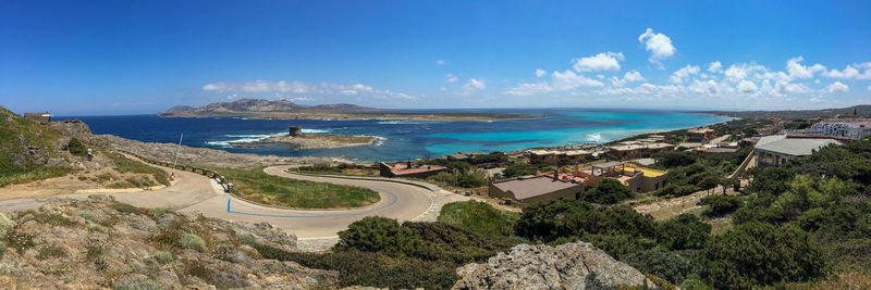 Panoramic shot of sea against blue sky