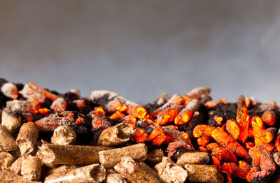 Close-up of burning wood pellets
