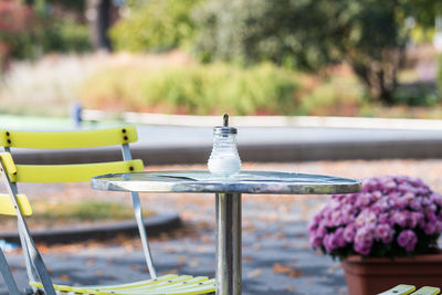 Sugar dispenser on a bistro table outdoors