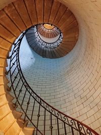 Directly below shot of spiral staircase in building