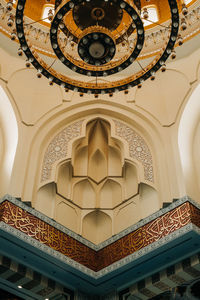 Low angle view of ornate ceiling of building