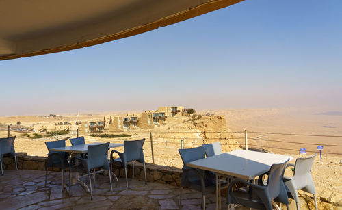 Scenic view of bereishit hotel and ramon crater from mitzpe ramon visitors center restaurant
