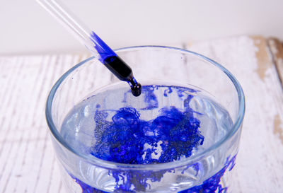 High angle view of drink in glass on table