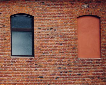 Window on brick wall of building