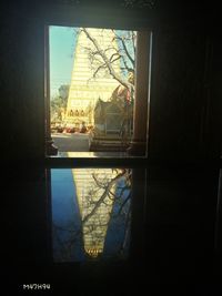 Buildings seen through glass window