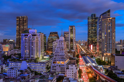 Bangkok business district cityscape with skyscraper at twilight, thailand