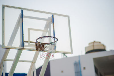 Low angle view of basketball hoop against sky