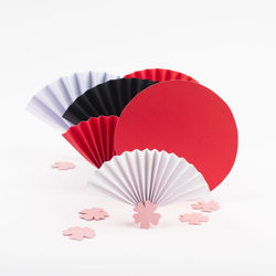 Close-up of umbrella against white background