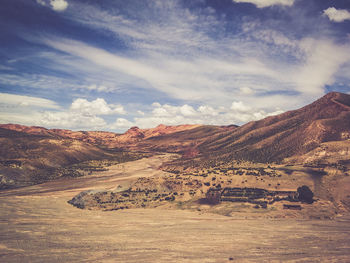 Scenic view of desert against sky