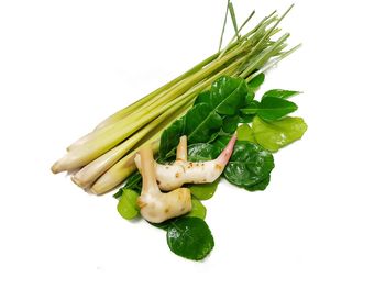 Close-up of fresh vegetables against white background