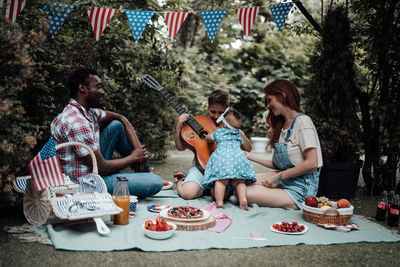 Group of people playing guitar