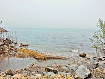 Scenic view of sea against clear sky