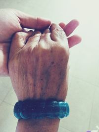 Close-up of hand holding ice cream