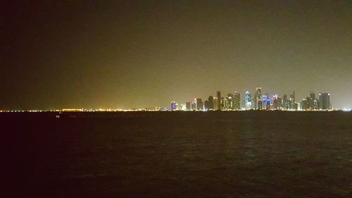 Illuminated cityscape at night